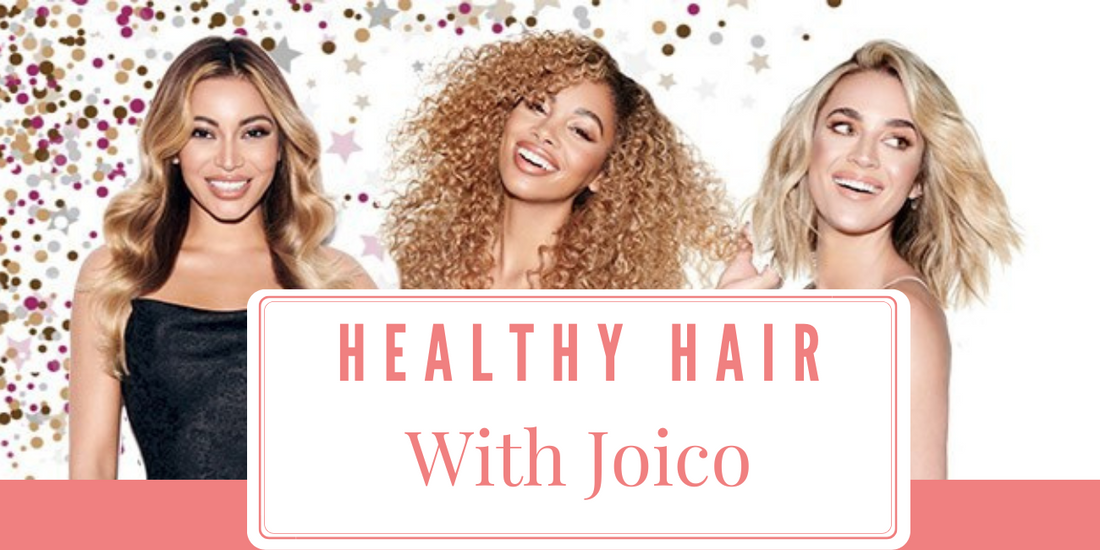 Three smiling women with healthy, styled hair promoting Joico professional haircare for strength, shine, and salon-quality results.