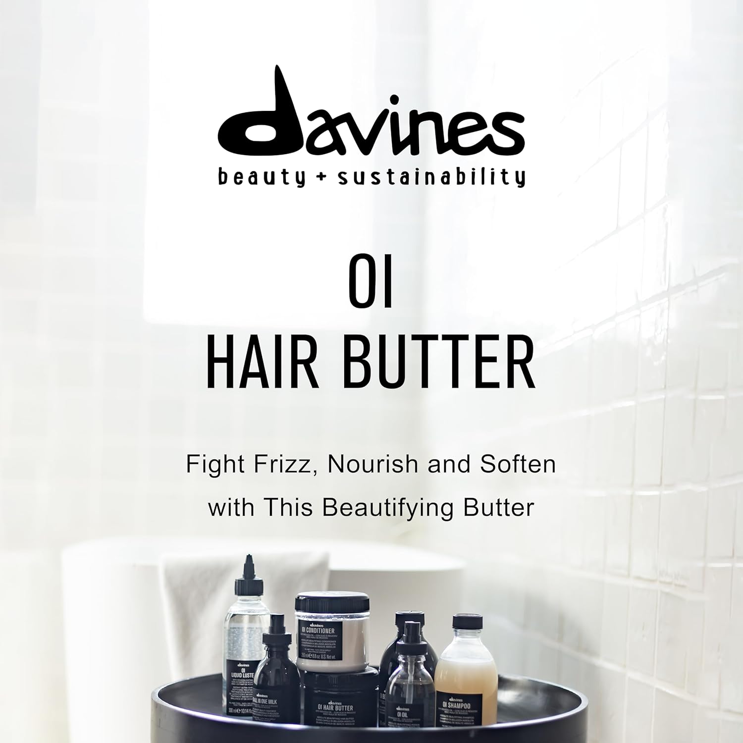 Davines OI Hair Butter products on a shelf with a white tiled wall Bombshell collar city salon and suites troy ny