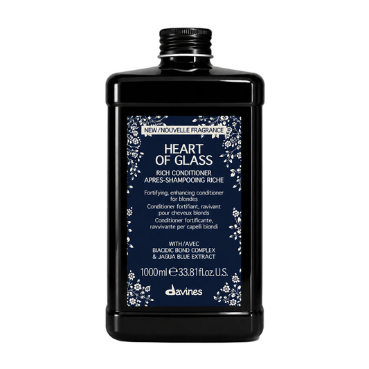 Davines Heart of Glass Rich Conditioner liter duo 1000ml bottles for blonde hair on a clean white background.