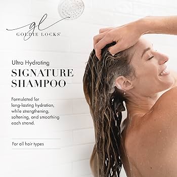 Model washing hair with Goldie Locks Signature Shampoo, ultra-hydrating formula for all hair types