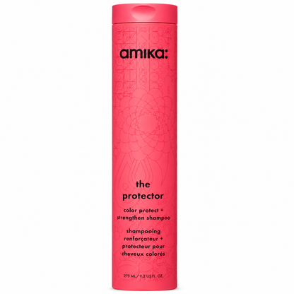 Amika The Protector Color Protect + Strengthen Shampoo 9.2 oz bottle on a white background.