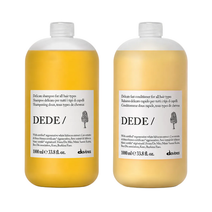 Two bottles of Dede hair care products on a white background