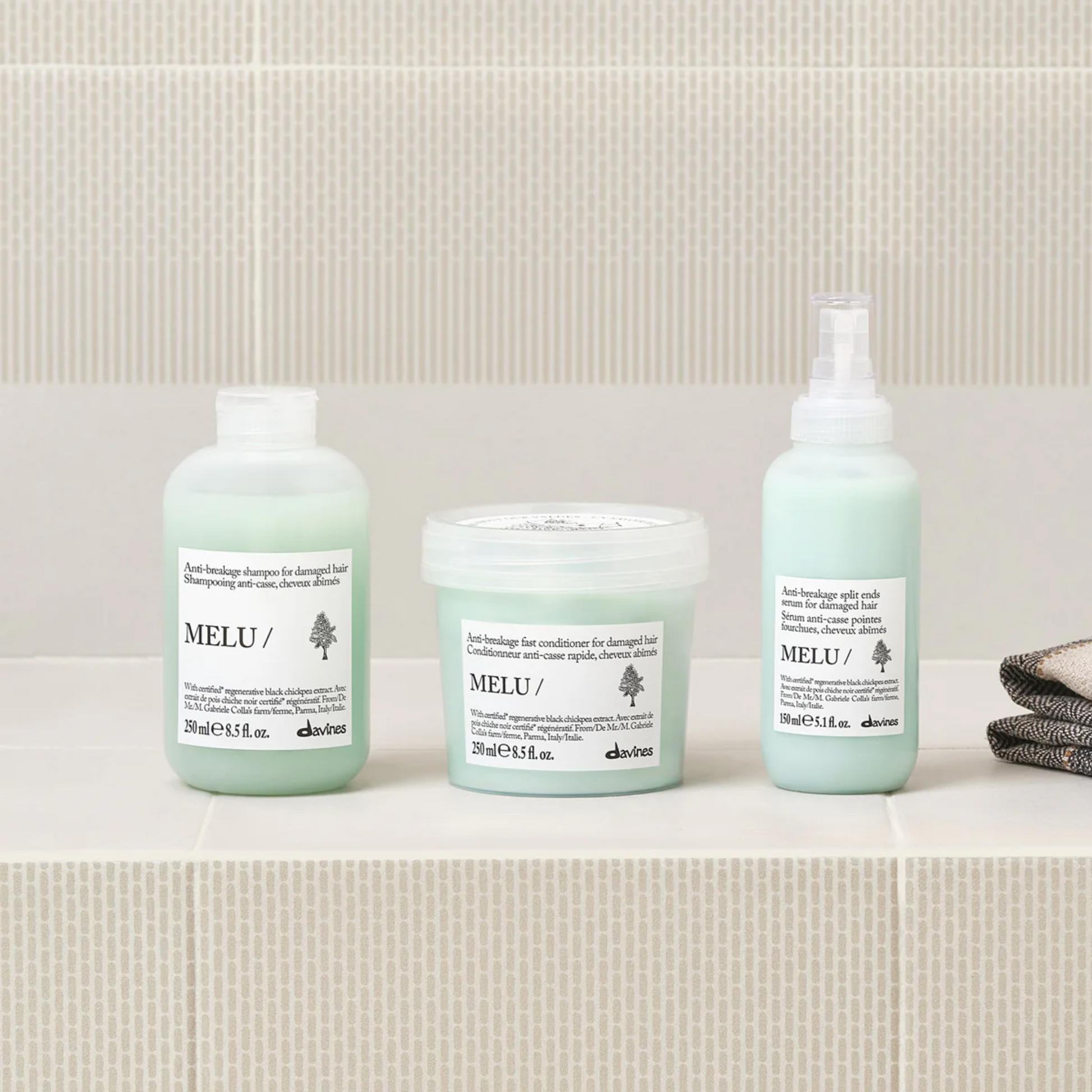 Davines MELU shampoo conditioner and serum complete anti breakage routine for damaged hair strengthening and split end repair