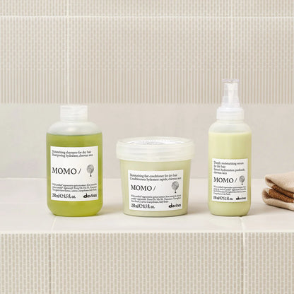 Davines MOMO shampoo conditioner and moisturizing serum complete hydration routine for dry hair adding softness shine and moisture