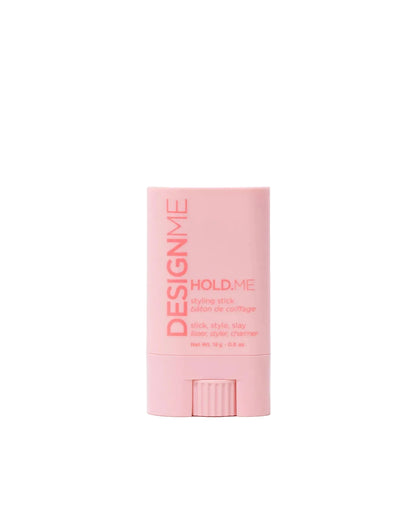Instantly tame flyaways and frizz with DESIGNME HOLD.ME Styling Stick. This vegan wax stick provides medium hold, a smooth satin finish, and sleek, polished styles without flakes.
