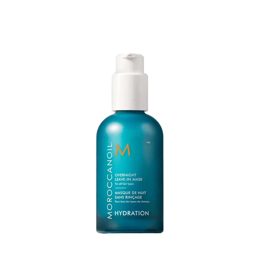 Moroccanoil Hydration leave in Mask hair oil in a translucent teal blue bottle with a white pump dispenser, set against a neutral beige background.