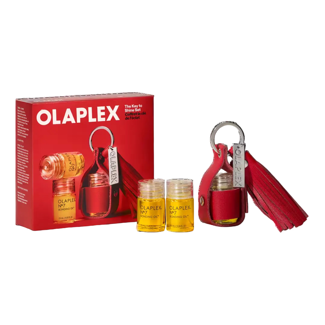 OLAPLEX The Key to Shine Set featuring three mini No.7 Bonding Oils and a limited-edition red keychain accessory
